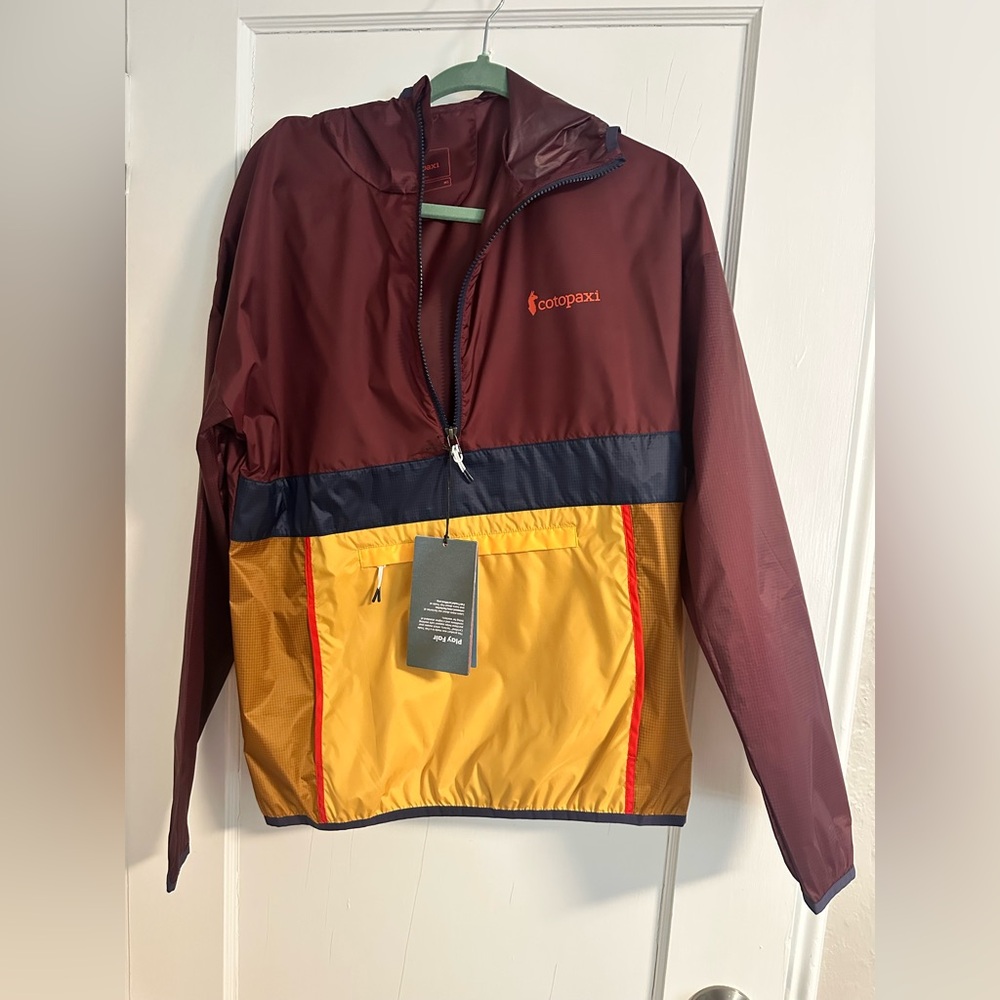 Cotopaxi Burgundy Half Zip Windbreaker with pouches. NEVER WORN